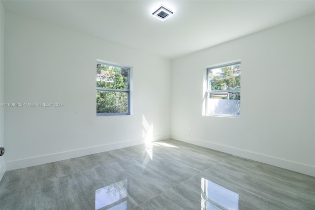 spare room with a wealth of natural light