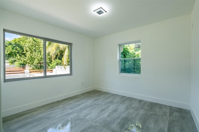 unfurnished room with a wealth of natural light