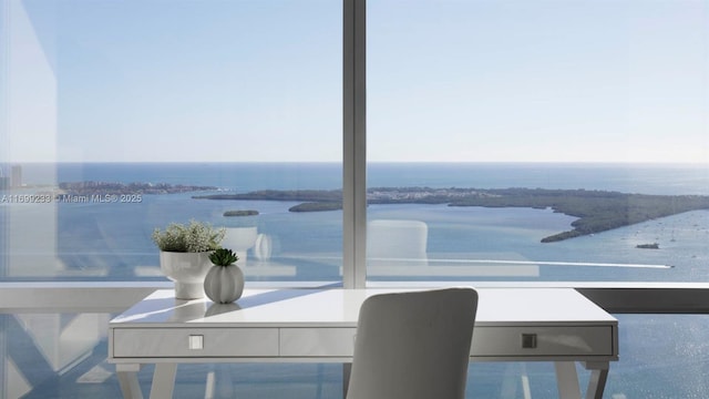 dining area with a water view