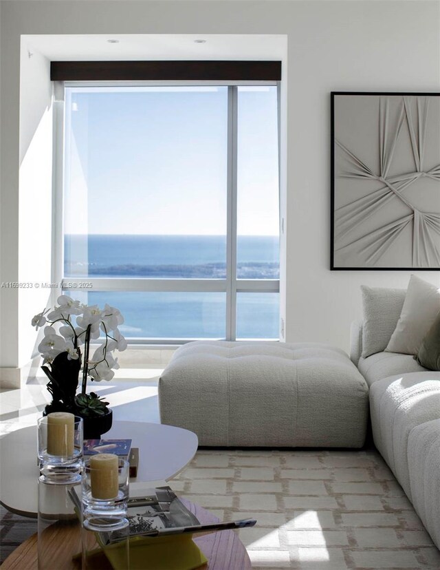 living room featuring a water view