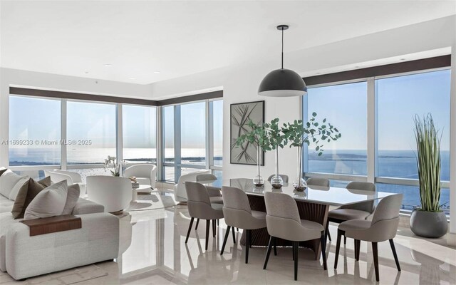 dining area with a water view