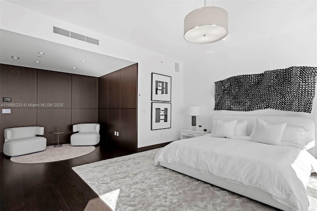 bedroom featuring hardwood / wood-style floors