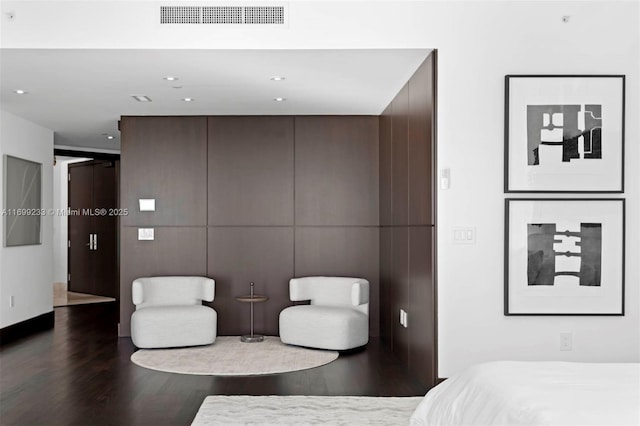 bedroom featuring dark wood-type flooring