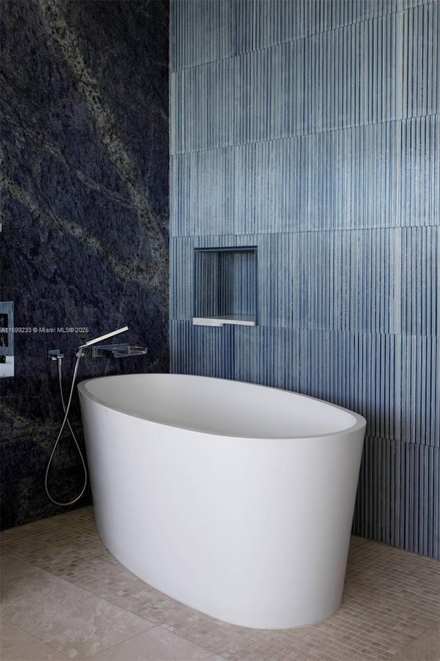 bathroom featuring tile walls and tile patterned floors