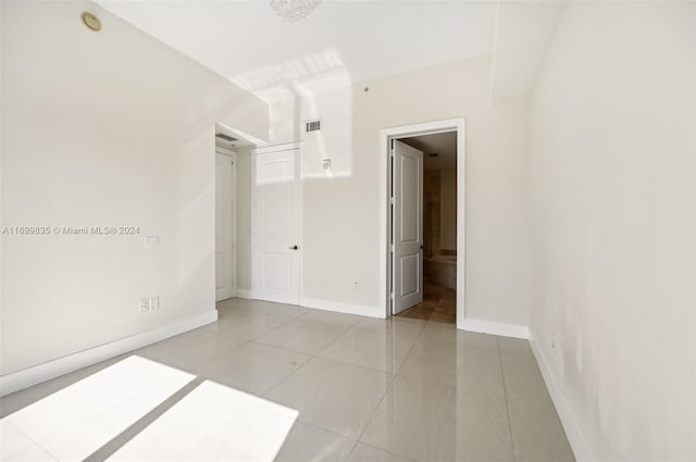 view of tiled spare room