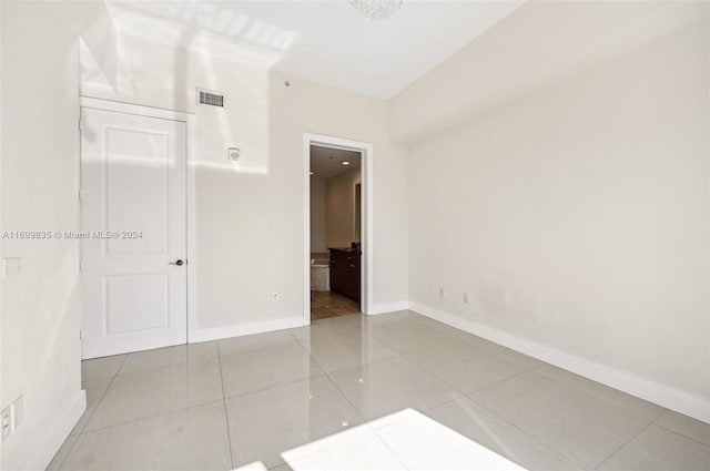 view of tiled spare room