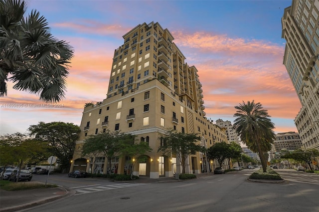 view of outdoor building at dusk