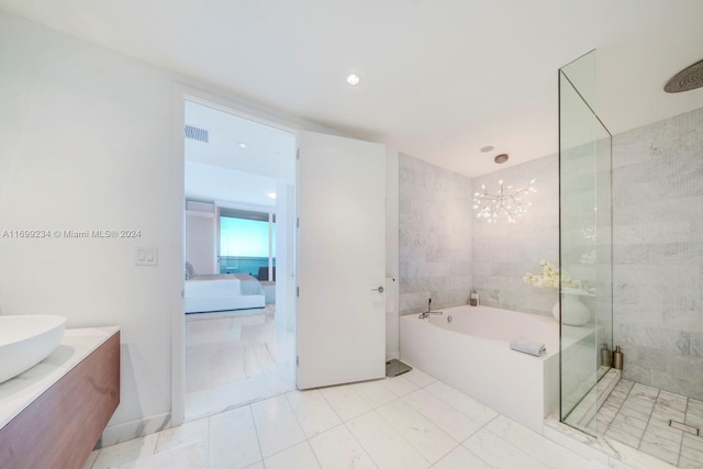 bathroom with vanity, plus walk in shower, and a notable chandelier