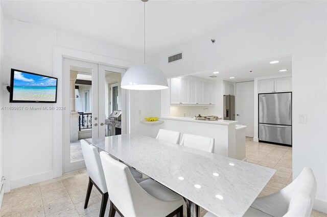 dining area featuring french doors