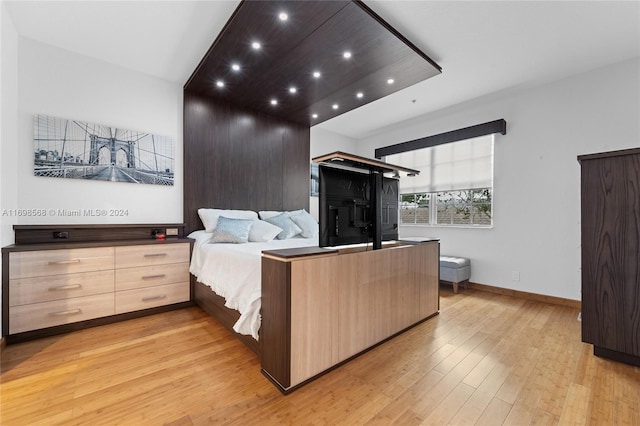 bedroom with light hardwood / wood-style floors