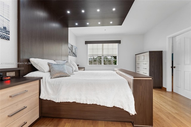 bedroom with light hardwood / wood-style floors