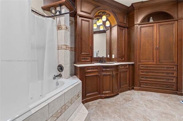 bathroom featuring tile patterned floors, vanity, and shower / bathtub combination with curtain