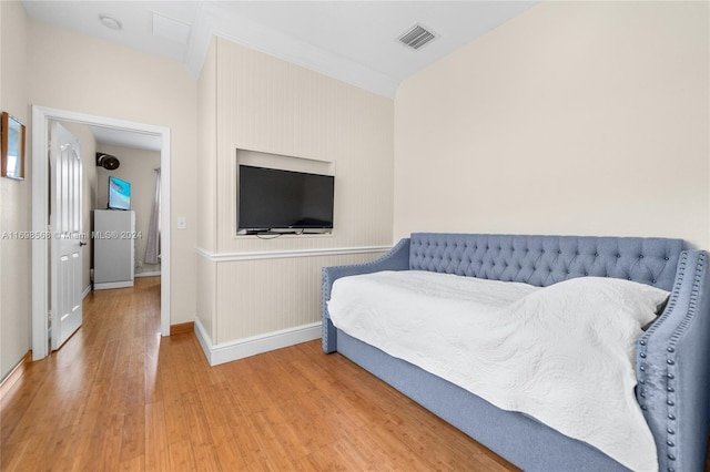 bedroom featuring hardwood / wood-style flooring