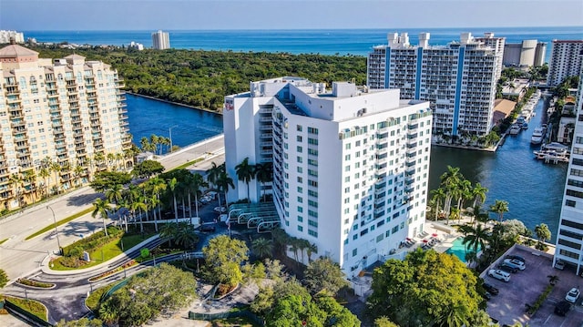 birds eye view of property featuring a water view