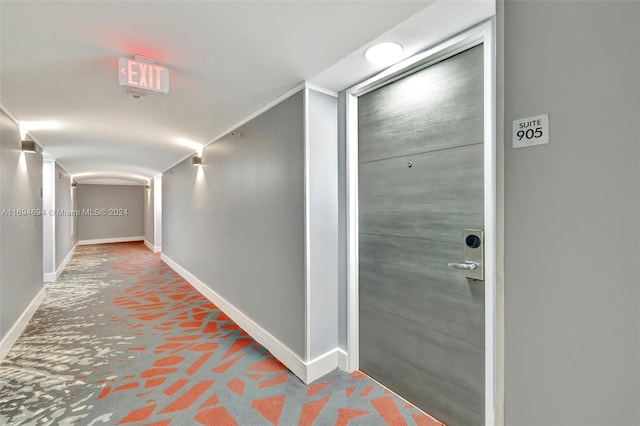 hallway featuring carpet floors