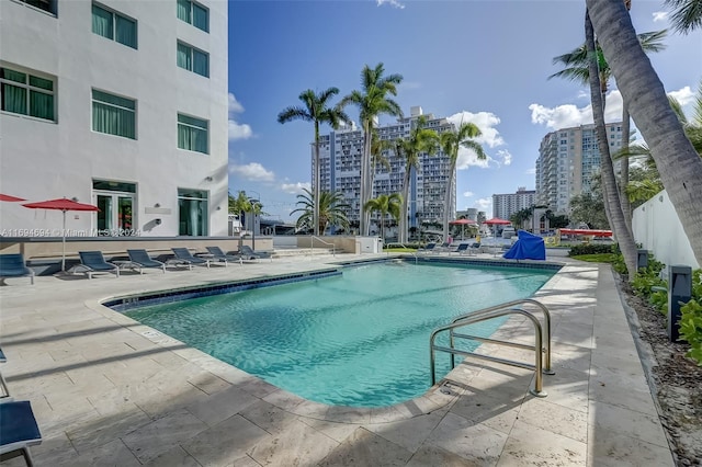 view of pool featuring a patio area