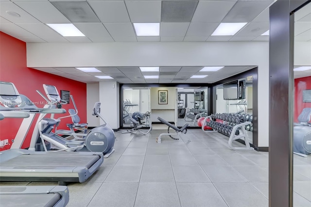 exercise room with a drop ceiling