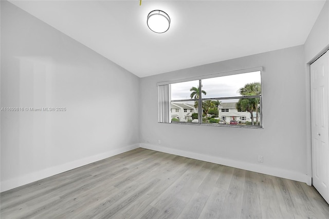 empty room with light wood-type flooring