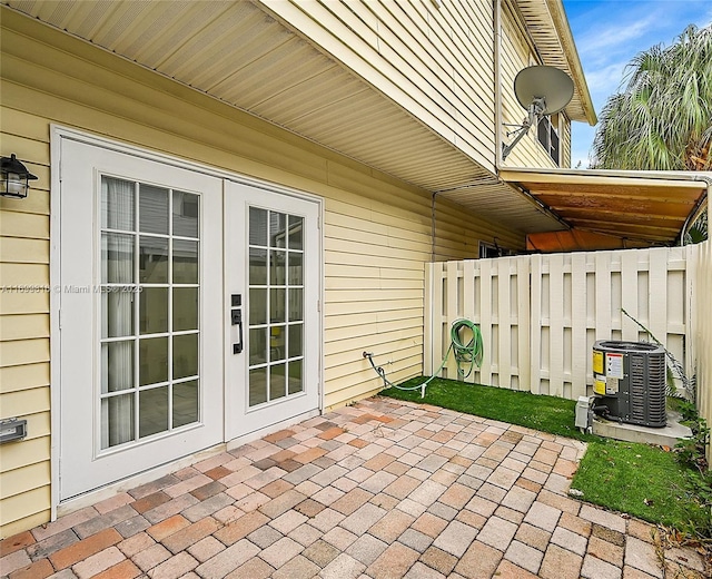 view of patio featuring french doors and central AC unit