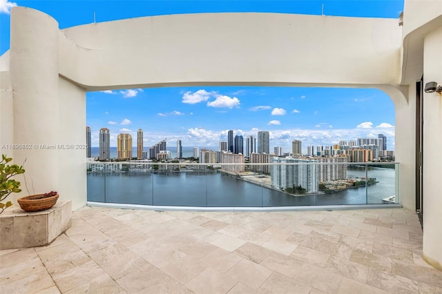 view of patio featuring a water view