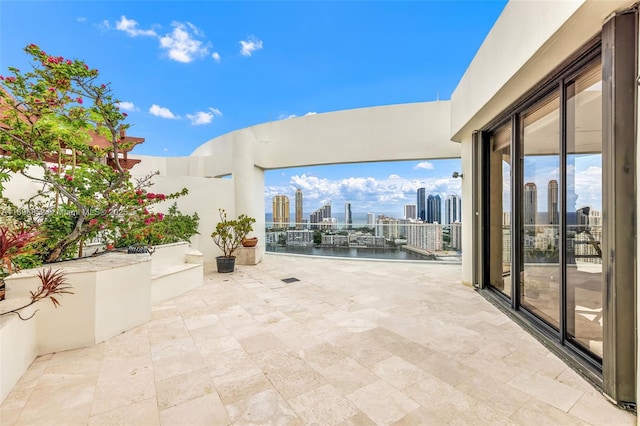 view of patio / terrace with a water view