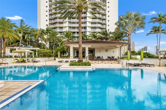 view of pool featuring a patio