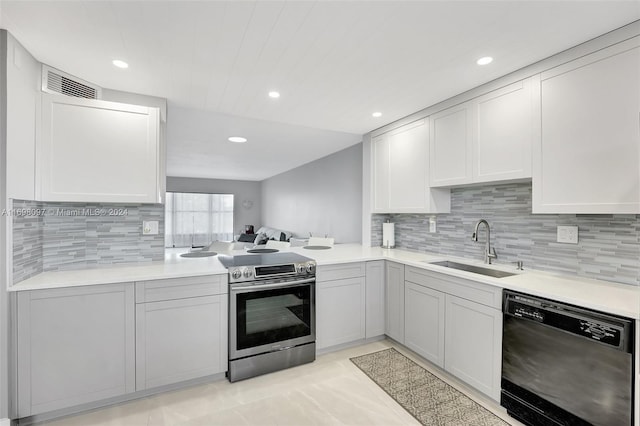 kitchen with tasteful backsplash, stainless steel electric range oven, dishwasher, and sink