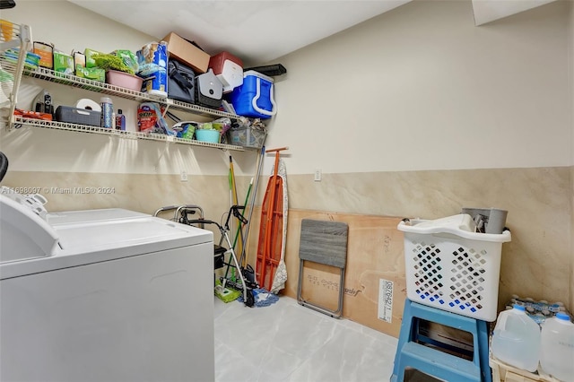 washroom featuring washer and dryer