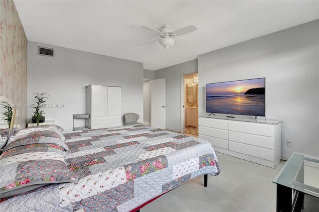 bedroom featuring connected bathroom and ceiling fan