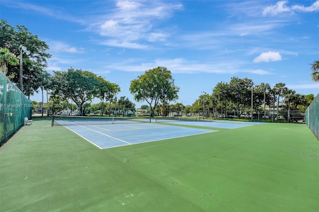 view of tennis court with basketball court