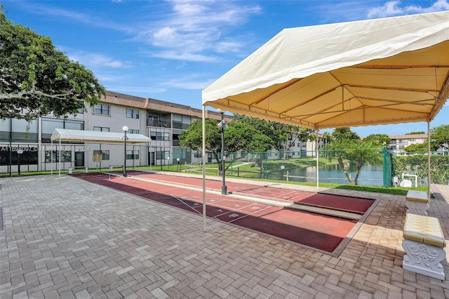 view of home's community featuring a water view