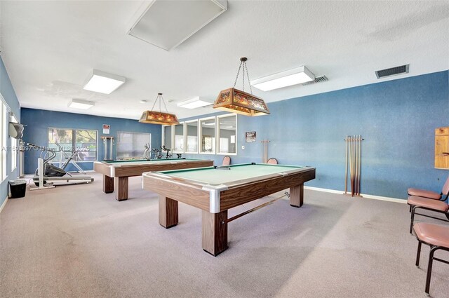 rec room with light carpet, a textured ceiling, and billiards