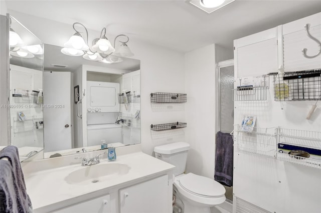 bathroom featuring vanity, toilet, and a shower with shower door