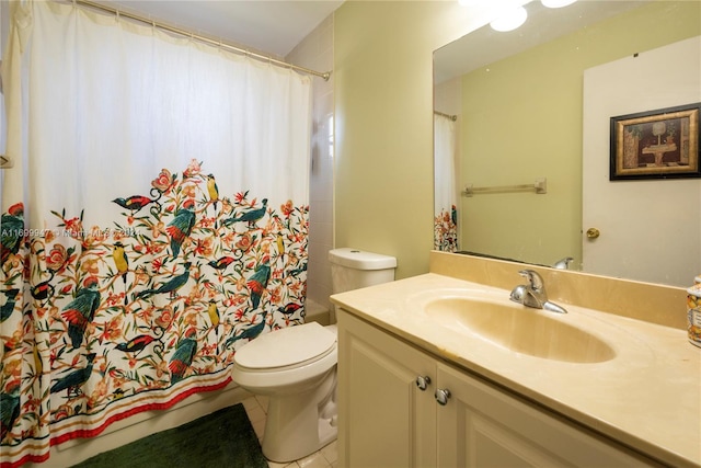 bathroom featuring curtained shower, tile patterned flooring, vanity, and toilet