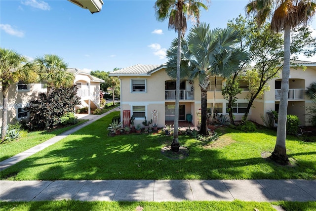 view of front of home with a front yard