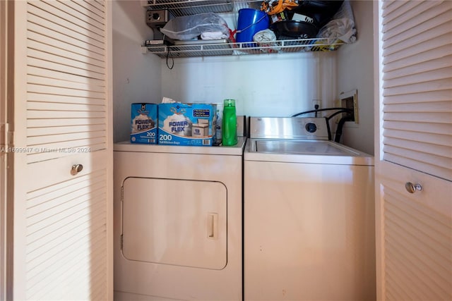 laundry room with separate washer and dryer