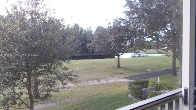 view of yard with a water view