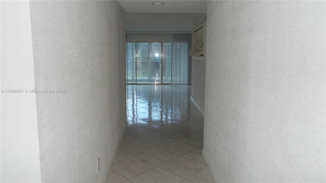 corridor featuring tile patterned flooring