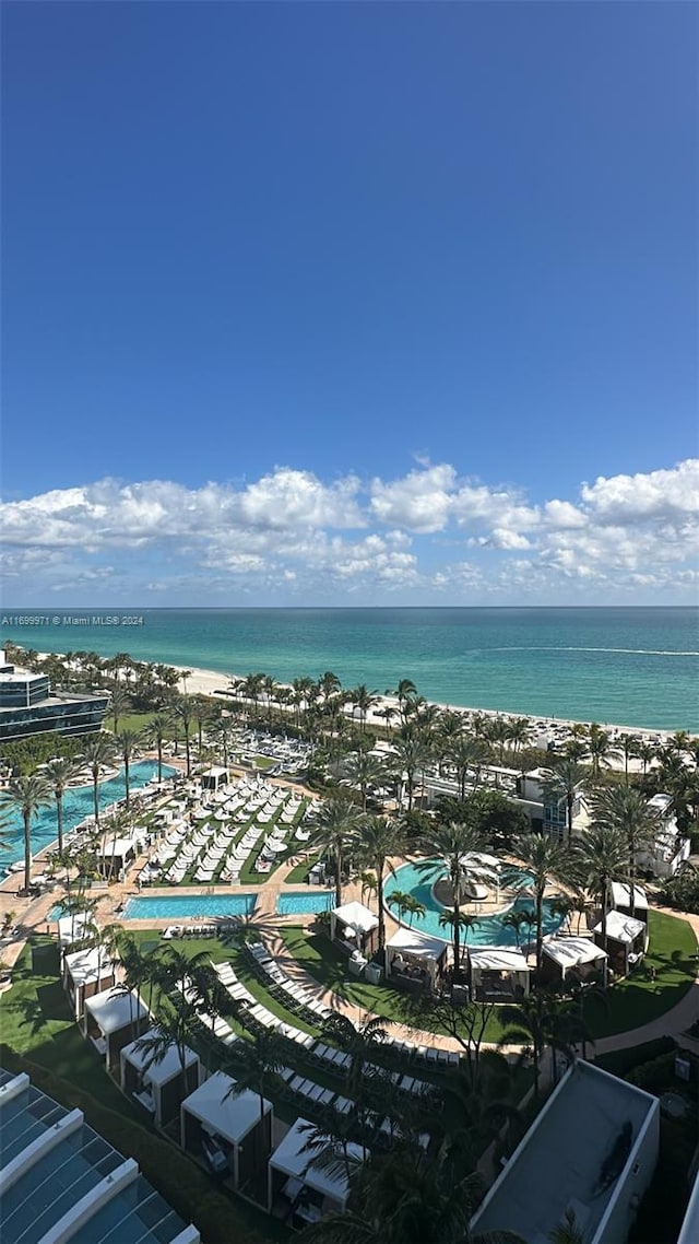 aerial view featuring a water view and a view of the beach