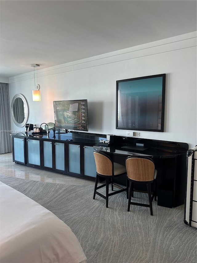 interior space featuring carpet and crown molding