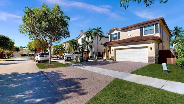 view of front of home with a garage