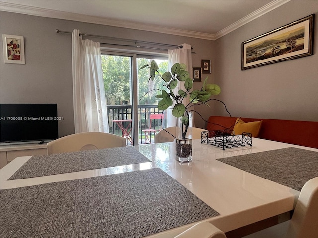 dining room with crown molding