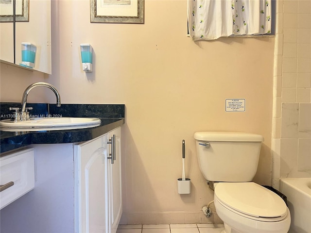 full bathroom featuring tile patterned flooring, vanity, shower / bath combination, and toilet