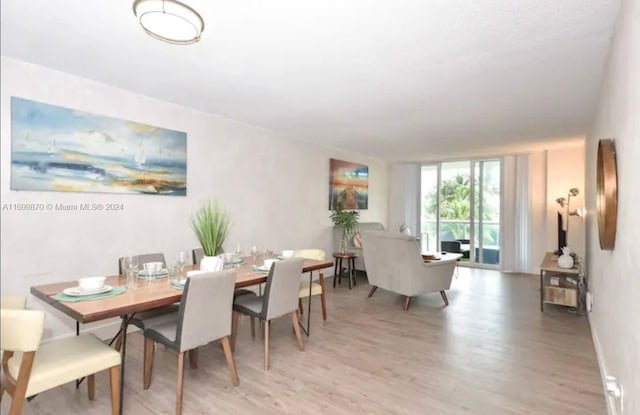 dining room featuring light hardwood / wood-style floors