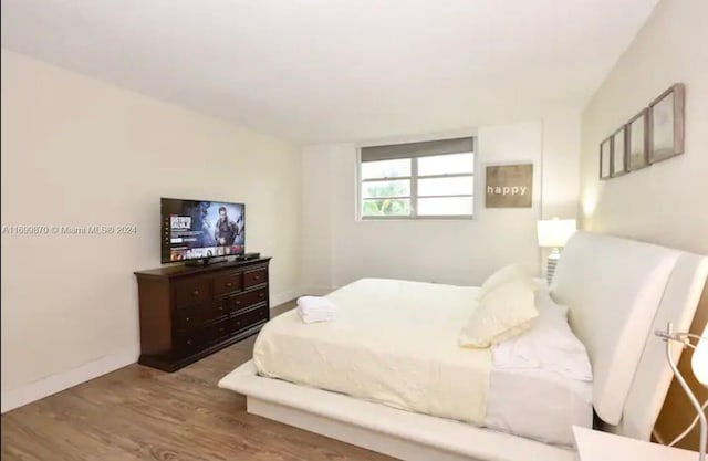 bedroom featuring wood-type flooring