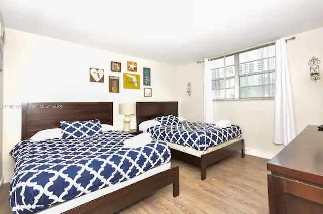 bedroom featuring hardwood / wood-style flooring