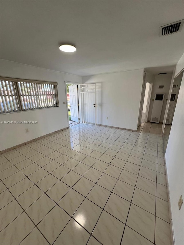 view of tiled spare room