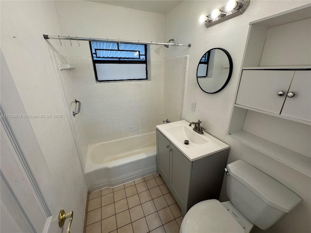 full bathroom featuring tile patterned floors, vanity, toilet, and tiled shower / bath