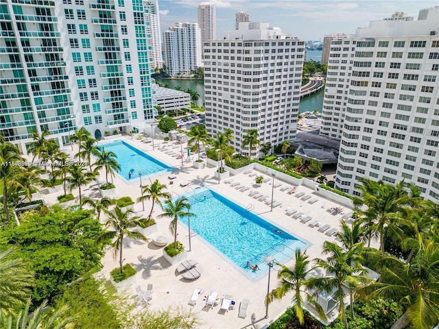 birds eye view of property featuring a water view