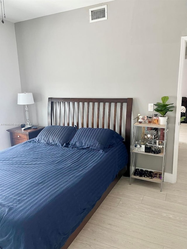 bedroom featuring light hardwood / wood-style floors